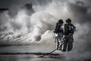 firefighter&#x27;s in a smoke cloud
