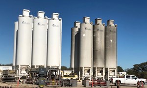 Fig. 5. The group of sand silos on the left had been working with Evolution on their electric fleet, while the silos on the right had been working on a conventional diesel wellsite.