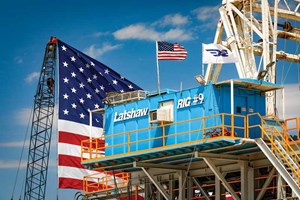 Fig. 1. The giant American flag erected for President Trump’s visit seems to dwarf Latshaw Drilling Rig 9. Photo: Double Eagle Energy.