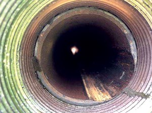 Fig. 1. In this example, severe friction caused deterioration in the pipe’s integrity, leading to tubing leaks and other associated problems.