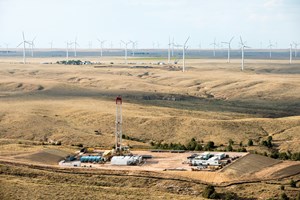 A Carrizo Oil &amp; Gas pad juxtaposed with wind turbines on the operator’s 36,200-acre DJ Niobrara leasehold. The independent has since idled its single operated rig. Photo: Carrizo Oil &amp; Gas Inc.