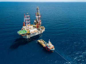 vessel moving offshore drilling rig to prepare for monsoon season