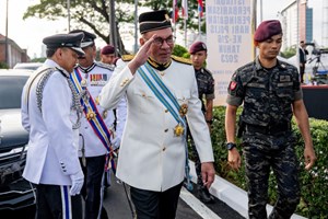 Fig. 1. Malaysian Prime Minister Datuk Seri Anwar Ibrahim (saluting) participates in an event at police training facilities in Kuala Lumpur. Image: Office of the Prime Minister, Malaysia.