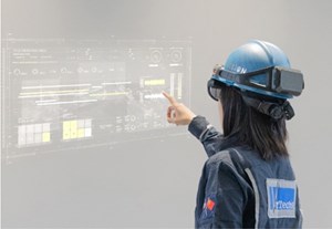 Fig. 5. An engineer uses a mixed reality headset to view holographic images of drilling equipment, tools and dashboards. This enables off-location training and technical support while mitigating the risks of exposing personnel to dangerous environments and remote locations.