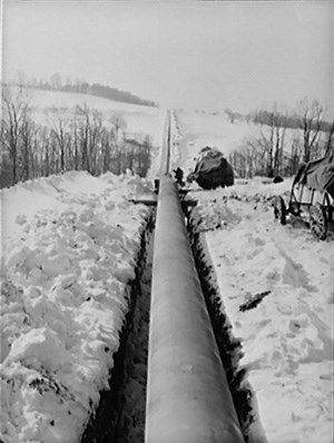 Fig. 1. Shown while under construction during 1942-1943, the Big Inch (24-in.) crude oil pipeline is an example of where the U.S. was united on a common purpose—winning World War II. Officially named the War Emergency Pipeline, it passed through 10 states and connected Baytown, Texas, on the Gulf Coast, with Linden, N.J. Image: Library of Congress.